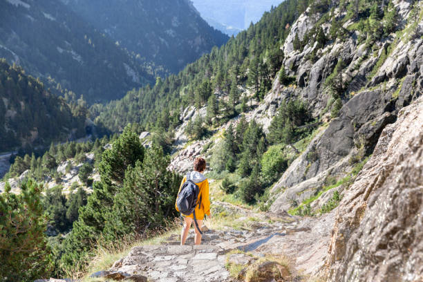 istock Girl trail hiking in Pyrenees, Spain. 1170494230