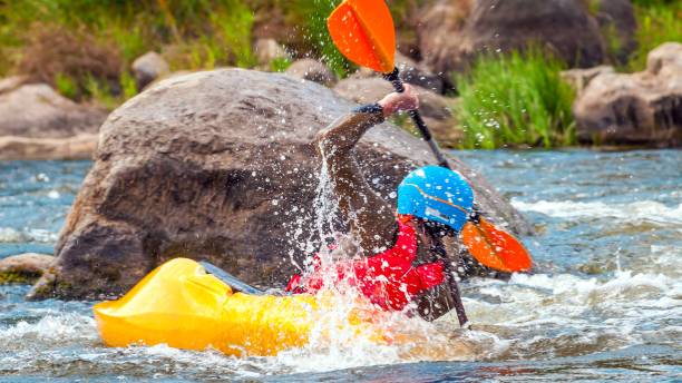 istock Playboating. Kayaking freestyle on whitewater. Eskimo roll. 1170497381