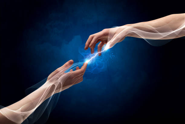 istock Hands connecting through fingers in space 1170497856
