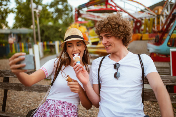 istock Happy couple having date and eating ice cream 1170498010