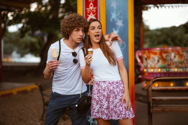 istock Happy couple having date and eating ice cream 1170500201