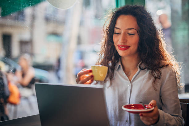 istock Beautiful lady on coffee break in cafe 1170500356