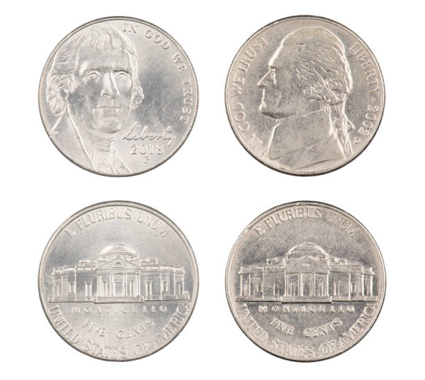 istock Old and New American Nickels isolated on white background 1170501614