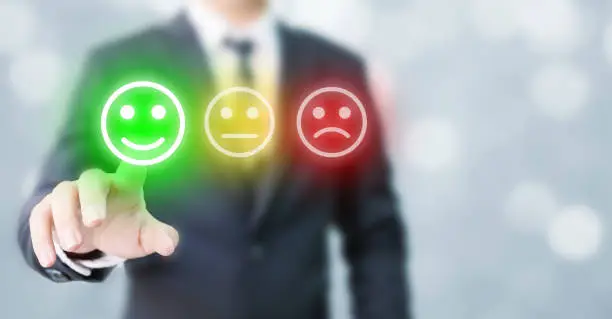Photo of Businessmen choose to rating score happy icons. Customer service experience and business satisfaction survey concept