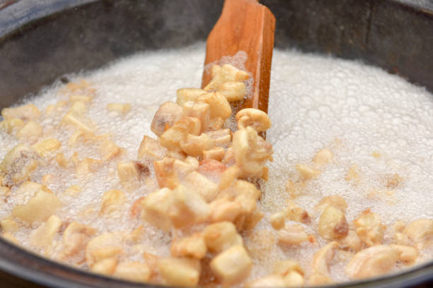 istock Preparing delicious unhealthy fried pork cracklings 1170502983