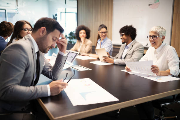 istock Successful group of business people at work in office 1170503283