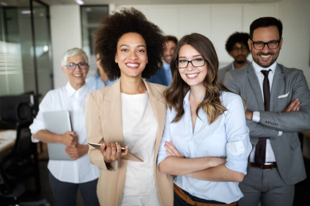 istock Successful group of business people at work in office 1170503531