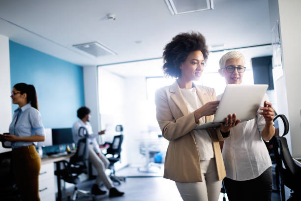 istock Successful business group of people at work in office 1170503757