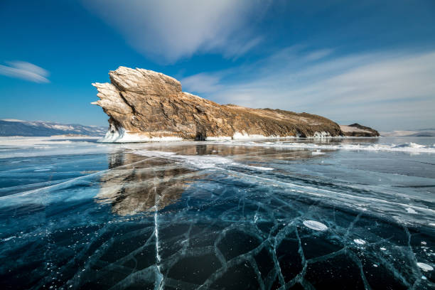 ogoy insel im winter - larch tree stone landscape sky stock-fotos und bilder