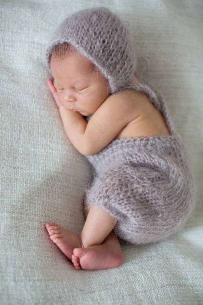 istock Newborn baby boy, sleeping happily 1170507190