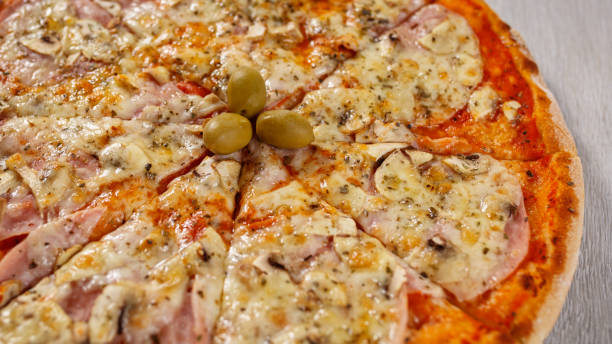 istock Delicious capricciosa pizza 1170507279