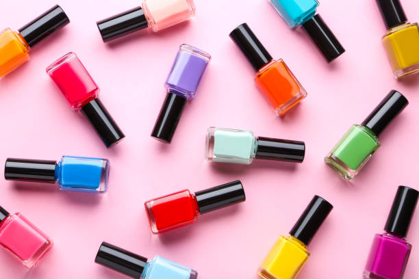 istock Nail polish bottles on pink background 1170507515