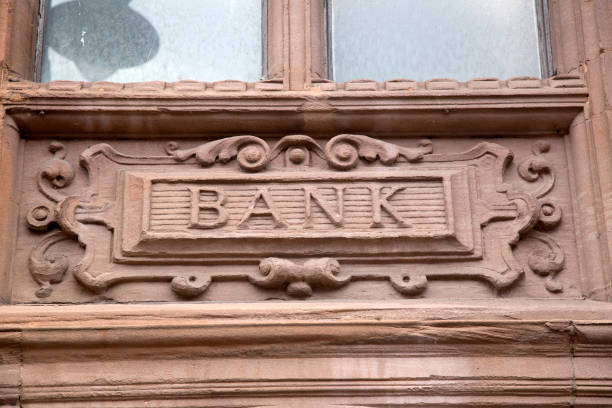istock Bank Sign over Branch 1170508631