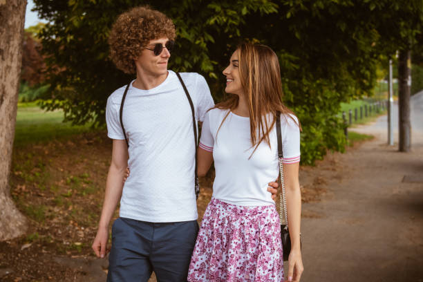 istock Couple walking and  looking each other 1170509119
