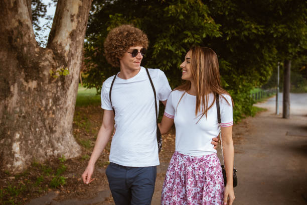 istock Couple walking and  looking each other 1170509247