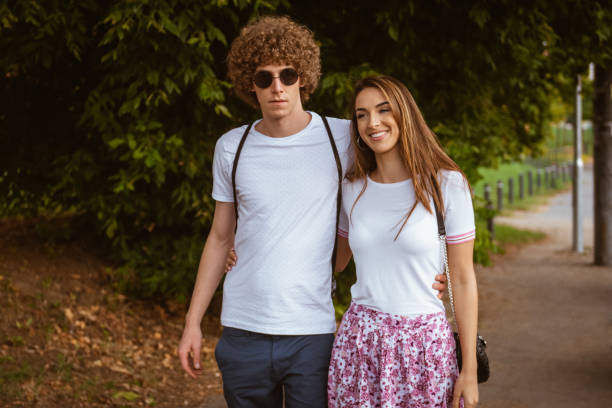 istock Couple walking and  looking each other 1170509321