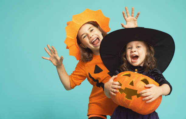 little witches on turquoise background.