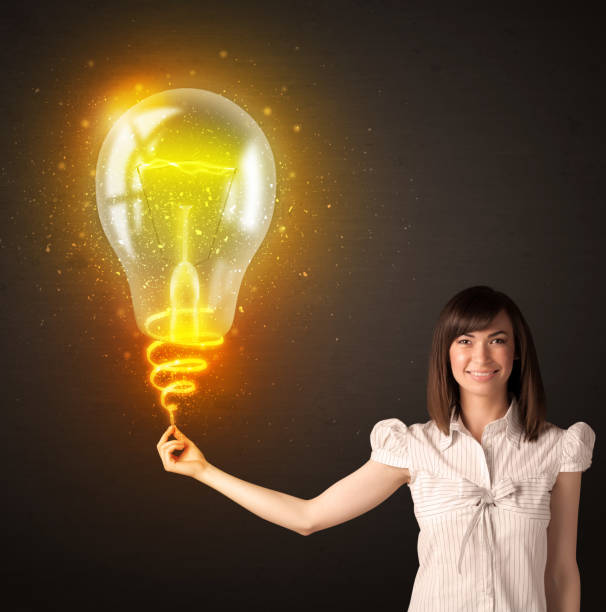 istock Businesswoman with an idea bulb 1170524935