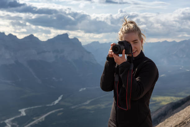 istock Girl on top of Mountain 1170528215