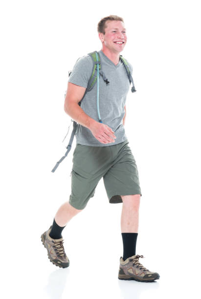 istock Friendly male hiker is happy and walking 1170530203