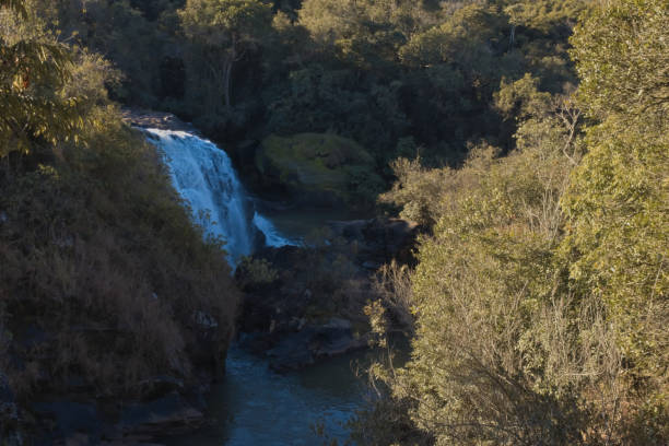 istock Bridal Veil Waterfall, surrounded by greenery, illuminated by the evening light. 1170532391