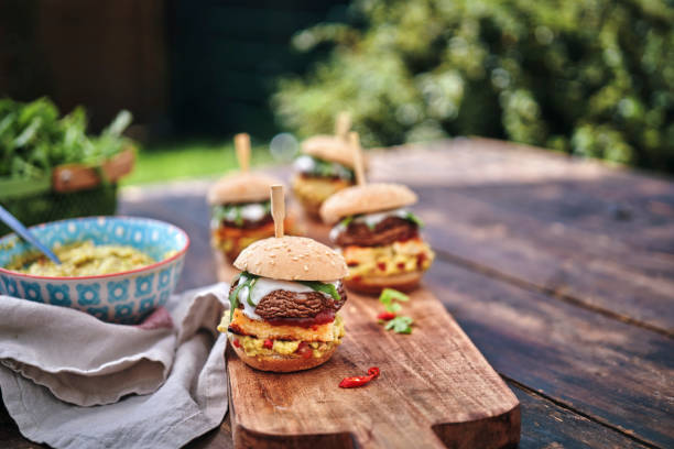 istock Mini Veggie Burger with Grilled Cheese, Mushroom, Guacamole and Arugula 1170532448
