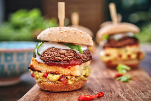 istock Mini Veggie Burger with Grilled Cheese, Mushroom, Guacamole and Arugula 1170532455