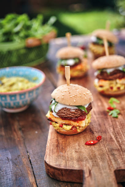 istock Mini Veggie Burger with Grilled Cheese, Mushroom, Guacamole and Arugula 1170532457