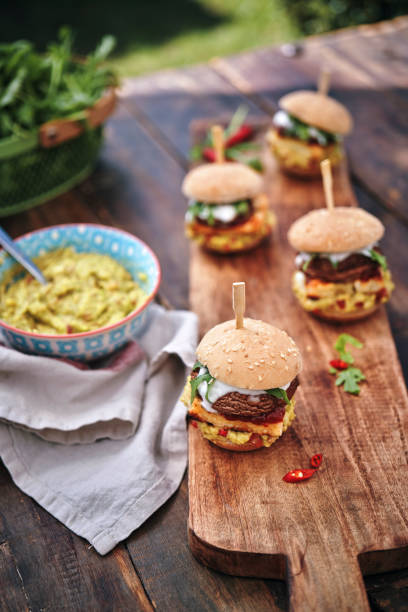 istock Mini Veggie Burger with Grilled Cheese, Mushroom, Guacamole and Arugula 1170532458