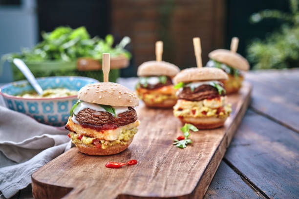 istock Mini Veggie Burger with Grilled Cheese, Mushroom, Guacamole and Arugula 1170532466
