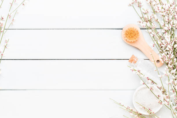 istock Beauty and aromatherapy concept with spa set on pastel rustic wooden background. 1170533103