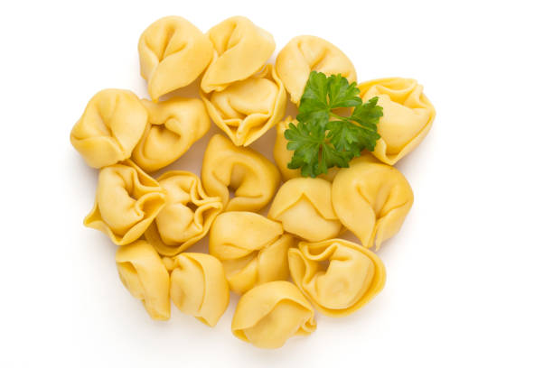istock Raw homemade pasta,tortellini with herbs. 1170534703