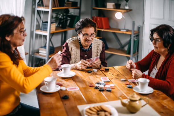 istock Active senior women playing games at home 1170539044