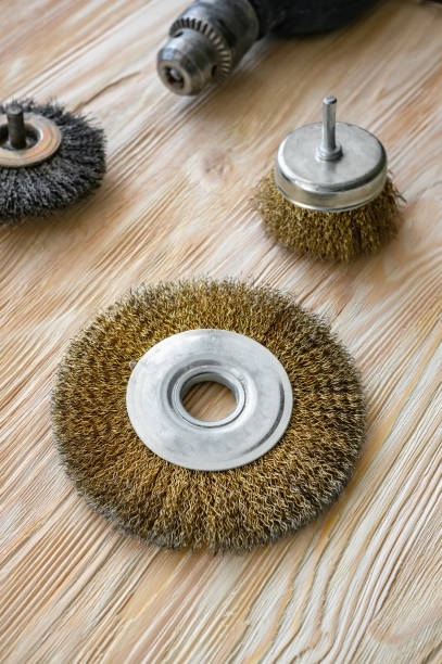 istock abrasive tools for brushing wood and giving it texture. Wire brushes on treated wood 1170541572