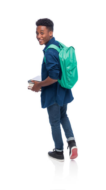 istock Student walking and turning to look over shoulder 1170541817