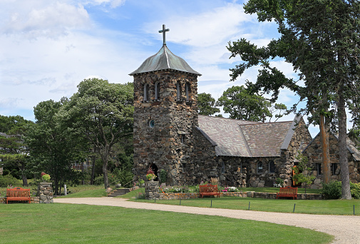 View at the bell towers and part of the church of the Catholic Maria Laach Abbey near Glees in Germany. The abbey dates back to the year1100 and is now a monastery of the Benedictine Confederation.