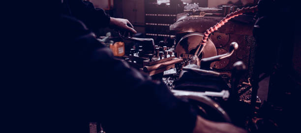 istock Industrial factory worker operate Lathe machine 1170547382