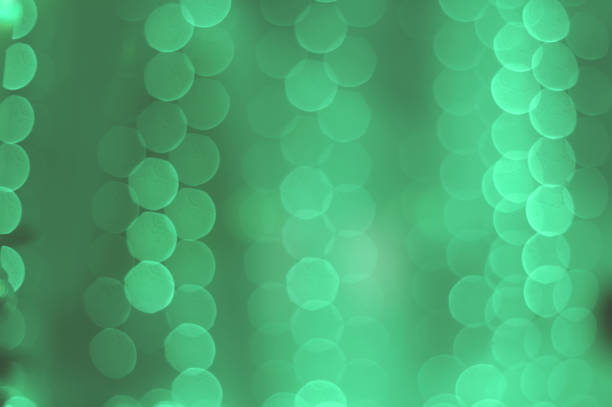 istock neo-mint bokeh of garland lights texture. 1170551279