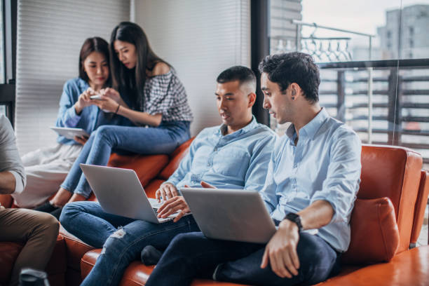 istock Group of friends working together 1170554840