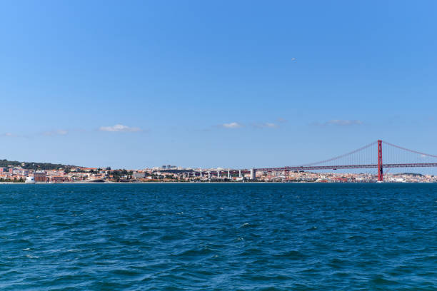 istock Bridge April 25-de Abril, connecting Lisbon 1170555158