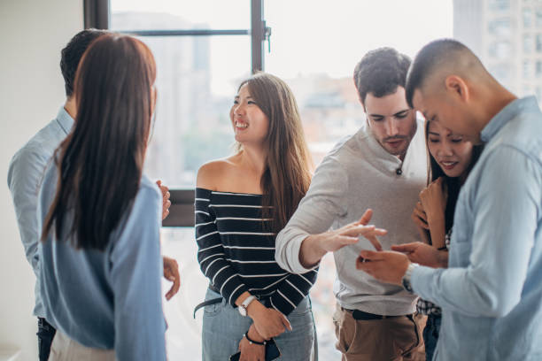 istock Millennial friends watching mobile phones 1170555316