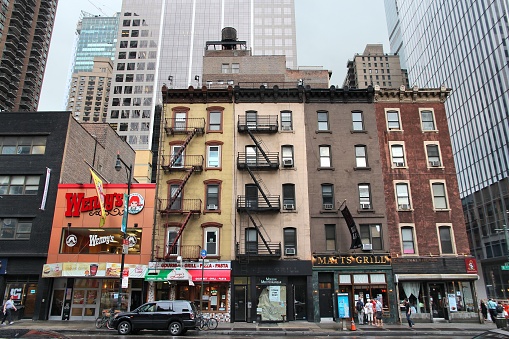 People walk along 8th Avenue in Midtown Manhattan. Almost 19 million people live in New York City metropolitan area.