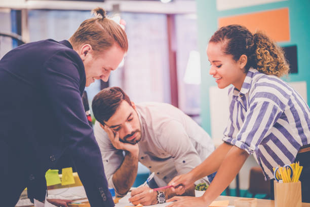 istock Team of young Architect Designer is brainstorming in office 1170555970