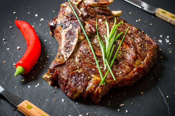 istock Grilled club steak on slate plate 1170556338