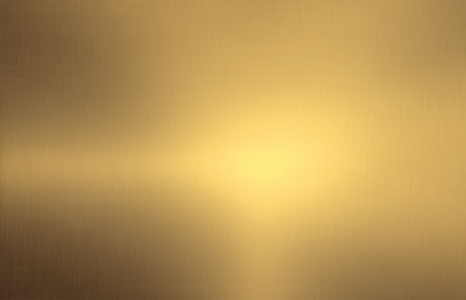 Close up empty shiny brushed gold color metal surface texture