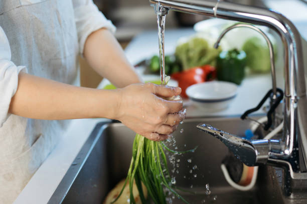 istock Woman cooking in the kitchen 1170558238