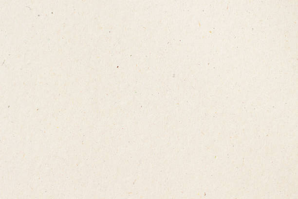 Paper texture cardboard background close-up. Grunge old paper surface texture Paper texture cardboard background close-up. Cream light grunge old paper surface texture cream colored photos stock pictures, royalty-free photos & images