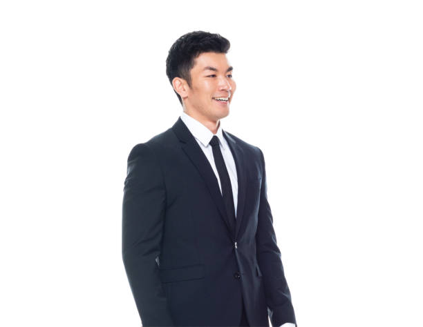 istock Attractive looking Chinese businessman - hands by side 1170560570
