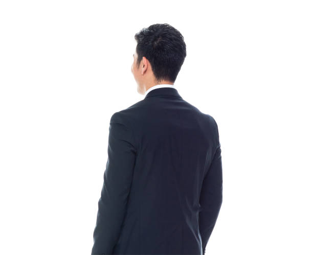 istock Attractive looking Chinese businessman - hands by side 1170560931