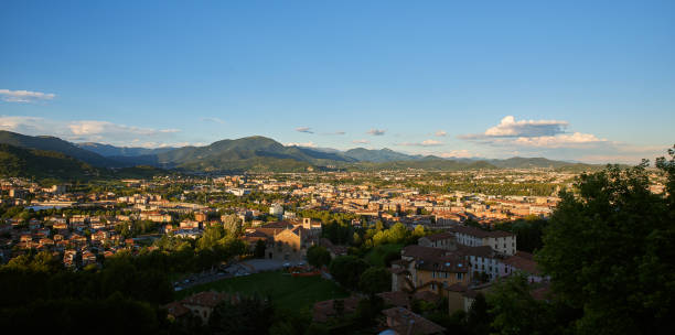 istock Bergamo with Alps mountains and blue cloudy sky 1170562215